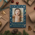 Merry Christmas Modern Scandi Blue Custom photo<br><div class="desc">Show off a memorable family photo by customising the picture on this Modern Merry Christmas holiday card, dark blue background with scandi illustration art of pine, stars and rainbows. Real gold foil enhance the look of this card. Send a special card this season with your family name and year. Spread...</div>