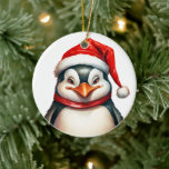 Merry Christmas Penguin in Santa Hat Scarf Cute Ceramic Tree Decoration<br><div class="desc">Adorable penguin wearing a Santa hat and scarf wishes you a very Merry Christmas.</div>