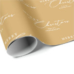 Merry Christmas Personalised Modern Elegant Script Wrapping Paper<br><div class="desc">Elevate your holiday gifts with this custom golden mustard yellow wrapping paper, featuring a "Merry Christmas" message and your family's name in elegant white script. The warm mustard hue adds a modern and stylish touch, perfect for creating beautifully wrapped presents that make a statement. Ideal for family gatherings, holiday parties,...</div>