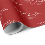 Merry Christmas Personalised Modern Elegant Script Wrapping Paper<br><div class="desc">This custom Christmas wrapping paper features a stylish, modern design with elegant script text on a red background. Featuring "Merry Christmas" and your family name, it's perfect for adding a sophisticated, personal touch to your holiday gifts. The minimalist, chic look makes it ideal for any festive occasion, whether you're wrapping...</div>