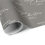 Merry Christmas Personalised Modern Elegant Script Wrapping Paper<br><div class="desc">Wrap your gifts in style this holiday season with this custom taupe wrapping paper, featuring a "Merry Christmas" message in elegant white script and your family's name. The chic taupe colour brings a modern and sophisticated touch to your presents, making them stand out under the tree. Perfect for family gatherings,...</div>