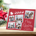 Merry Christmas Photo Collage Santa Sleigh Holiday Card<br><div class="desc">Festive red holiday folded card with a 5 photo collage of scattered pictures in white frames, a white illustration of reindeers flying Santa's sleigh, "Merry Christmas" in a stylish white script and your name in simple modern white typography. Customise your greeting on the inside or leave blank for handwritten notes....</div>