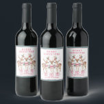 Merry Christmas Reindeer Personalised Name Wine Label<br><div class="desc">Merry Christmas Reindeer Personalised Name Festive Party Personalised Name Wine Labels Stickers features festive reindeer with pink bows and floral accents with the text "Merry Christmas" in modern pink calligraphy script typography with your personalised name. Perfect personalised gift for Christmas and the holidays for family and friends. Designed by ©2024...</div>