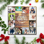 Merry Christmas Rustic Wood 12 Photo Collage Holiday Card<br><div class="desc">Send out your Christmas best wishes with this elegant holiday card that features your 12 favourite photos that capture your year on a rustic wood background. Designed by Thisisnotme©</div>