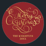 Merry Christmas Script Faux Gold Your Colour Classic Round Sticker<br><div class="desc">Elegant personalised Christmas sticker with a MERRY CHRISTMAS greeting in an elegant and modern calligraphy script typography in faux metallic gold against your choice of background colour (shown in red). ASSISTANCE: For help with design modification or personalisation, colour change, transferring the design to another product or if you would like...</div>