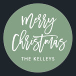 Merry Christmas Script Green Personalized Classic Round Sticker<br><div class="desc">Use the template form to add your personalization. Choose the option "customize further" to change the background color and/or font.</div>