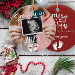 Merry Christmas see you in 2025 photo pregnancy Ceramic Tree Decoration<br><div class="desc">Modern funny see you in 2025 script,  footprints,  and red hearts new baby expecting parents keepsake Merry Christmas from mummy's tummy red tree ornament with your custom ultrasound photo.</div>