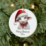 Merry Christmas Sheep in Santa Hat Red Bow Custom Ceramic Tree Decoration<br><div class="desc">Adorable sheep in Santa’s hat and a red bow wishes you a very Merry Christmas.  Personalise with greeting of your choice (Merry Christmas,  Happy Holidays,  Seasons Greetings) or your family’s last name and the year.</div>