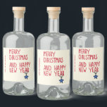 Merry Christmas Simple Modern Typography Liquor Bottle Label<br><div class="desc">Merry Christmas Simple Modern Typography Christmas Liquor Labels features the text "Merry Christmas and Happy New Year" in modern red script typography on a cream background accented with a simple star decoration. Personalise with your name or company name below. Perfect gifts for family and friends. Designed by Evco Holidays www.zazzle.com/store/evcoholidays...</div>