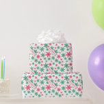 Merry Christmas Snowflakes Wrapping Paper<br><div class="desc">What better way to present that special gift at Christmas than to wrap it up in quality wrapping paper. This design has 'Merry Christmas' inside an ornate frame with a red and green snowflakes background. Definitely worth paying a little more for a pattern that is not available in city stores...</div>