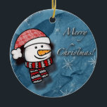 Merry Christmas, snowman with knitted clothes Ceramic Tree Decoration<br><div class="desc">A beautiful little snowman wearing white and red knitted clothes on a blue paper . Perfect to wish merry Christmas to the little ones.</div>