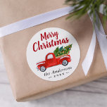 Merry Christmas Truck and Christmas Trees Holiday Classic Round Sticker<br><div class="desc">This classic design showcases a festive red truck loaded with Christmas trees,  bringing a sense of nostalgia to your celebrations. Perfect for decorating holiday cards,  sealing envelopes,  or adding a personalised touch to your Christmas gifts.</div>