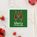 Merry Christmas Typography Red Green Pine Trees Napkin<br><div class="desc">Merry Christmas typography in white.  Abstract Christmas trees in crimson red.  Great for all your holiday parties.  So cute.  All your guests will rave.</div>