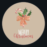 Merry Christmas Watercolor Candy Cane Classic Round Sticker<br><div class="desc">This round Christmas sticker features a festive watercolor graphic of a candy cane decorated with a ribbon and holly.</div>