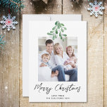 Merry Christmas Winter Greenery Mistletoe Photo Holiday Card<br><div class="desc">This simple and stylish Christmas card is decorated with watercolor mistletoe greenery and script typography.
Easily customisable with your photo.
Original Watercolor © Michele Davies.</div>