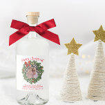 Merry Christmas Wreath Photo Frame Fun Holiday Liquor Bottle Label<br><div class="desc">These liquor bottle labels are perfect for home brewed spirits, or simply for sending holiday cheer. The design features a fun evergreen wreath photo frame with a red bow, bells and holly berries - upload your picture and it will appear in the centre of the wreath. The caption reads: Merry...</div>