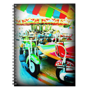 Merry Go Round Motor bikes at the Carnival Spiral Notebook