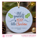 Merry Little Christmas Photo Ceramic Ornament<br><div class="desc">Celebrate the holiday season with a charming ornament that combines simplicity and elegance. This customisable design features a simple illustration of holly leaves set against a pale blue background. Elegant script typography that says, “Have Yourself a Merry Little Christmas, ” adds a touch of holiday cheer. Modify the background colour,...</div>
