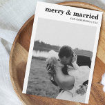 Merry & Married Modern Minimalist Photo Christmas Holiday Card<br><div class="desc">Cherishing Love & Celebrating Firsts: 'Merry & Married' Christmas Card Celebrate the joy of being 'Merry & Married' with our specially crafted Christmas card, designed for couples marking their first Christmas together as a married pair. The card showcases a modern, minimalist design in black and white, featuring a cherished photo...</div>