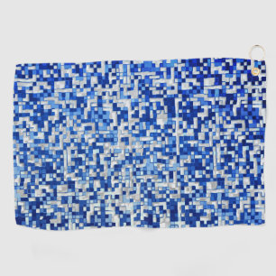 Mess of small squares, shades of blue with white golf towel