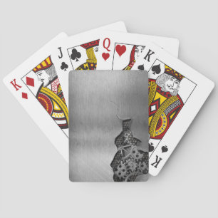 Metal background with mechanical damage playing cards