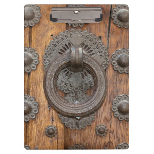 Metal Knocker on Old Wooden Door Clipboard