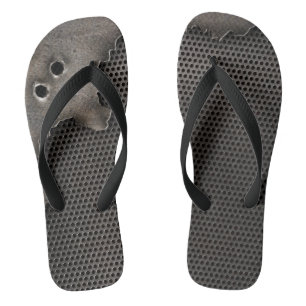 Metal with bullet holes background jandals