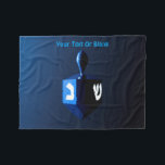 Metallic Blue Dreidel<br><div class="desc">A modernistic, metallic blue dreidel against a dark, night-like background. Two of the Hebrew letters found on a dreidel, nun and shin, glow brightly. Add your own text.</div>