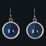 Metallic Blue Dreidel Earrings<br><div class="desc">A modernistic,  metallic,  blue dreidel against a dark,  night-like background.  Two of the Hebrew letters found on a dreidel,  nun and shin,  glow brightly.</div>