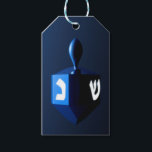 Metallic Blue Dreidel Gift Tags<br><div class="desc">A modernistic,  metallic blue dreidel against a dark,  night-like background.  Two of the Hebrew letters found on a dreidel,  nun and shin,  glow brightly.</div>