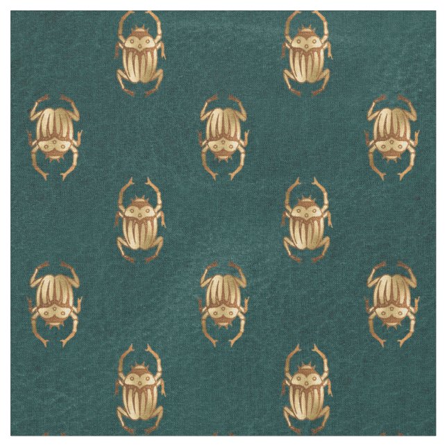 Metallic Gold Egyptian Scarab Beetles on Green Fabric (Close Up)