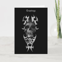Metallic skull on tribal style pattern card