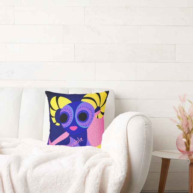 Mexican pink and blue folk art on cushion (Couch)