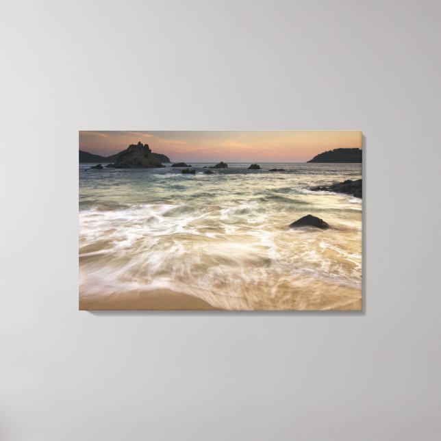 Mexico, Guerrero, Zihuatanejo.  Surf along a Canvas Print (Front)
