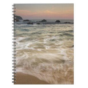 Mexico, Guerrero, Zihuatanejo.  Surf along a Spiral Notebook