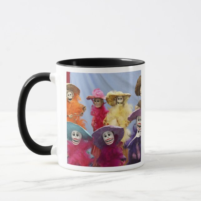 Mexico. Skeletal Catrinas, figures celebrating Mug (Left)