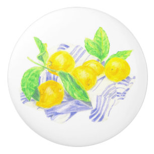 Meyer lemons on kitchen towel ceramic knob