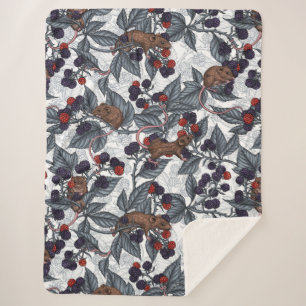 Mice and blackberries on white sherpa blanket