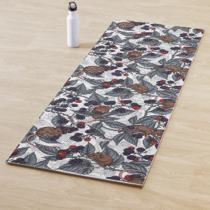 Mice and blackberries on white yoga mat