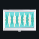 Mid Century Modern Argyle Business Card Holder<br><div class="desc">This Mid Century Modern Argyle Business Card Holder features a vibrant, turquoise background and a pattern of mod, translucent teal diamonds overlaying larger, vintage cream diamonds with gold coloured, space age speckles. This minimalist inspired, deconstructed argyle is a simplistic throwback of the larger than life atomic era that dominated the...</div>
