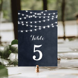 Midnight Blue String Lights Wedding Table Numbers<br><div class="desc">Chic modern summer wedding table number card design with simple elegant glowing string lights hanging across the top and a classy mix of modern and calligraphy script fonts on a printed faux watercolor texture background. A simple and stylish preppy design, perfect for summer! Click the CUSTOMIZE IT button to customise...</div>
