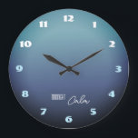 Midnight Calm Gradient Large Clock<br><div class="desc">A stylish wall clock inspired by the quiet beauty of midnight. The soft gray-blue gradient background evokes a calm night sky illuminated by moonlight. Bold modern numbers in white and turquoise create a striking contrast while keeping the design balanced and elegant. The “Midnight Calm” message adds a peaceful, relaxing mood—perfect...</div>