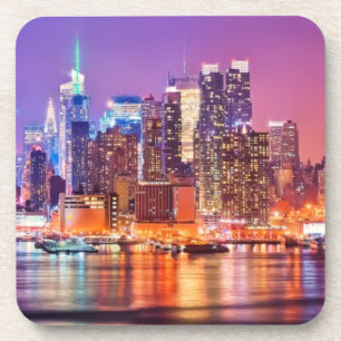 Midtown Manhattan at night with Empire Stae Coaster