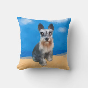 Miniature Schnauzer Dog On Beach Cushion