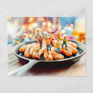 miniature workers frying sausages in pan holiday postcard