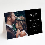 Minimal and Chic | Black Photo Wedding Thank You Card<br><div class="desc">These elegant,  modern wedding thank you folded cards feature a simple black text design that exudes minimalist style,  with your favourite personal wedding photo. Add your initials or monogram to make them completely your own.</div>