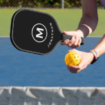 Minimal Black Classic Monogram Name Pickleball Paddle<br><div class="desc">Masculine modern design features black background with easy to use template for a single letter and name in stylish classic block typography. The design repeats on the reverse side. Perfect pickleball gift for him.</div>