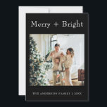 Minimal Black & White Typewriter Christmas Photo Holiday Card<br><div class="desc">A very unique and elegant stylish minimalist and modern Christmas card. Which features a minimalist customisable full family photo. With white typewriter typography of merry and bright. And under it the family name and years which can be both changed by clicking on the personalised button. And in the back of...</div>