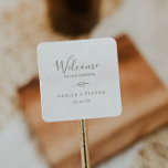 Minimal Leaf | Olive Green Wedding Welcome Square Sticker<br><div class="desc">These minimal leaf olive green wedding welcome stickers are perfect for an elegant wedding. The design features a simple greenery silhouette in olive green with classic minimalist style. Personalise these stickers with the location of your wedding, names, and wedding date. These labels are perfect for destination weddings and hotel guest...</div>