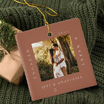 Minimal Modern Engaged & Merry 2 Photo Engagement Ceramic Ornament<br><div class="desc">Minimal and modern simple photo keepsake photo ornament to commemorate your first Christmas engaged. The design features a simple minimal design with a square photo design to display your special engagement photo. "Engaged & Merry", year and couple's name displayed in a simple modern design around the photo. Two photo ornament...</div>